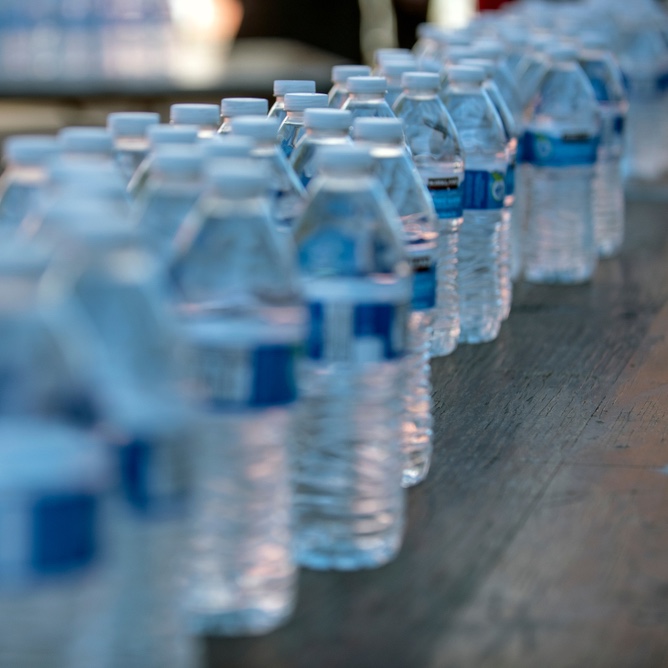 water bottles on table at donation center